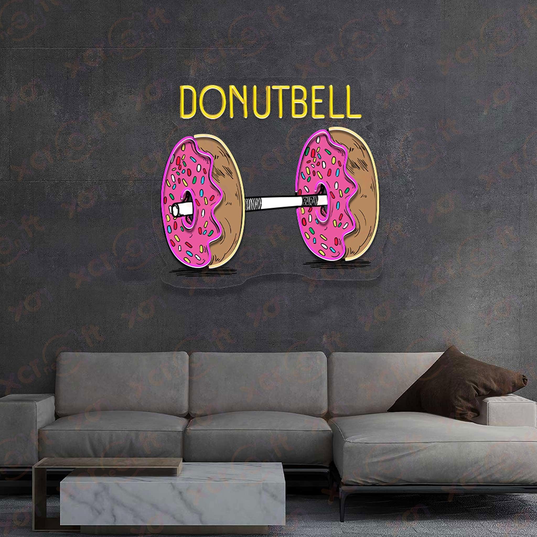 Neon Donutbell sign decorates the wall above a couch