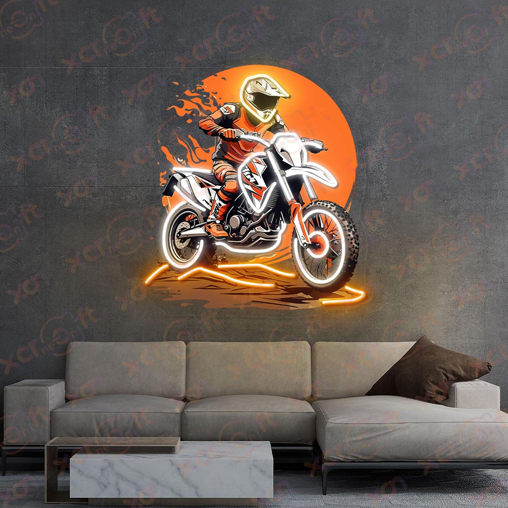 Neon sign of dirt biker jumping under sun.