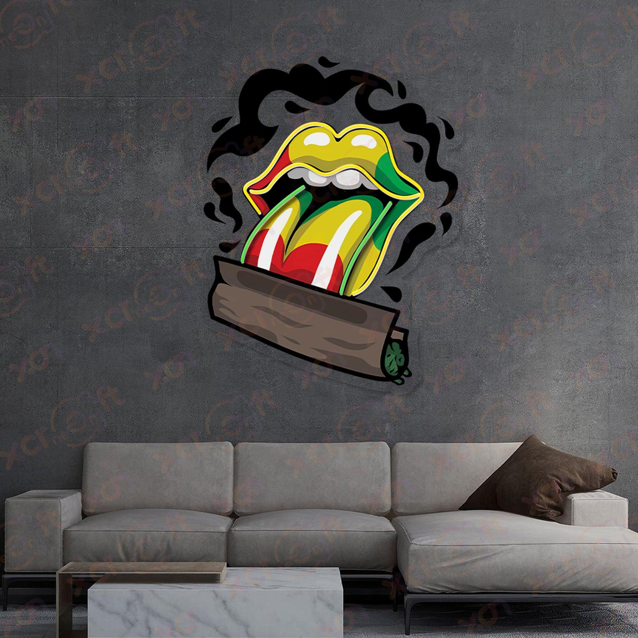 Neon wall art rock and roll tongue with marijuana leaf.