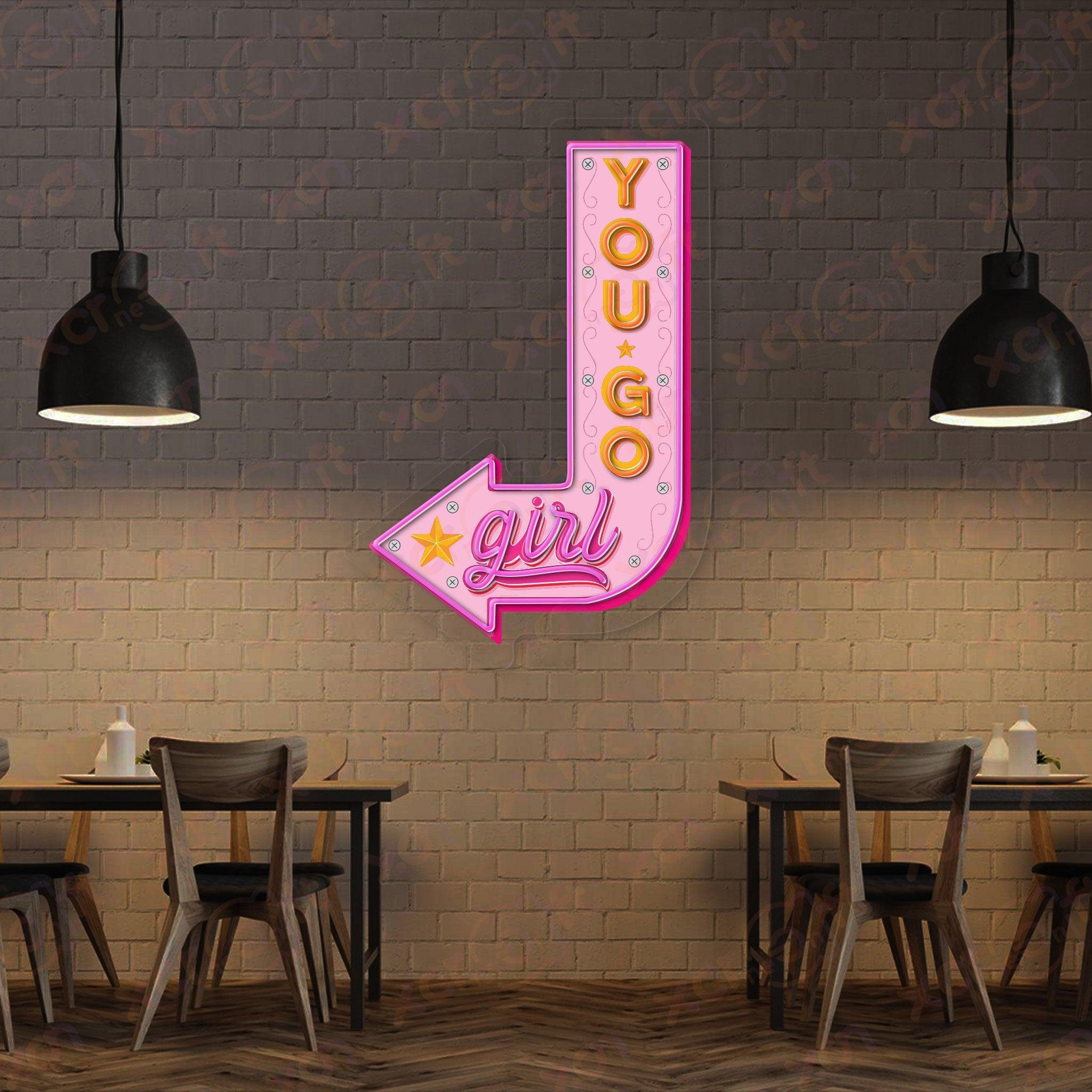 Bright neon sign adds fun, feminine touch to restaurant.